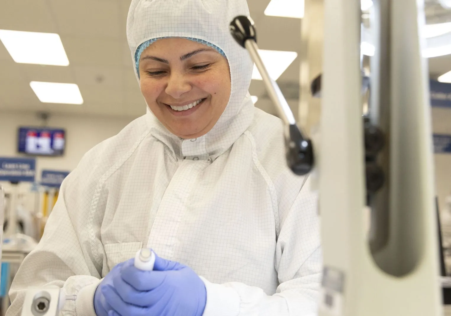 smiling harmac staff in cleanroom essentials