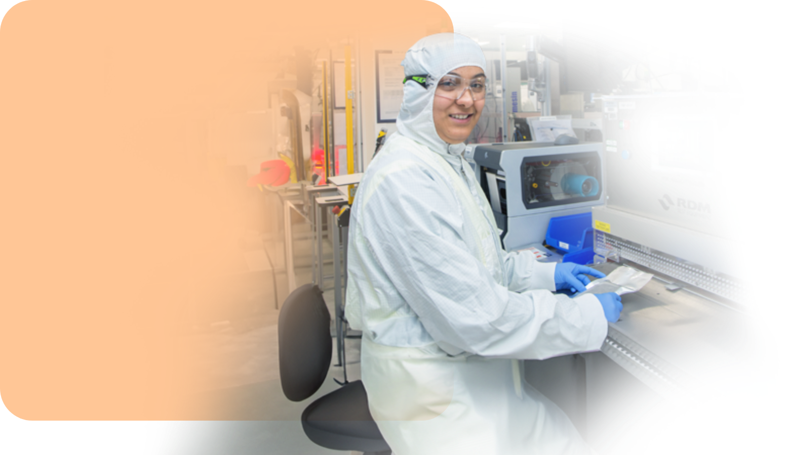 smiling staff at labelling in production line