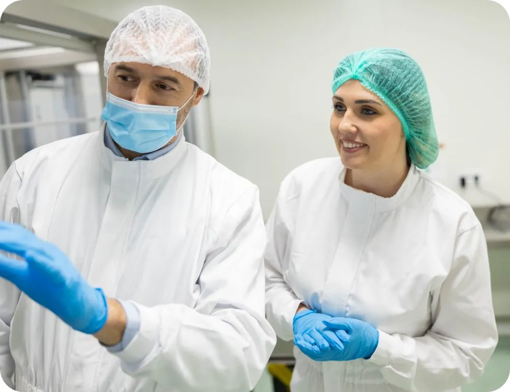 smiling cleanroom staff