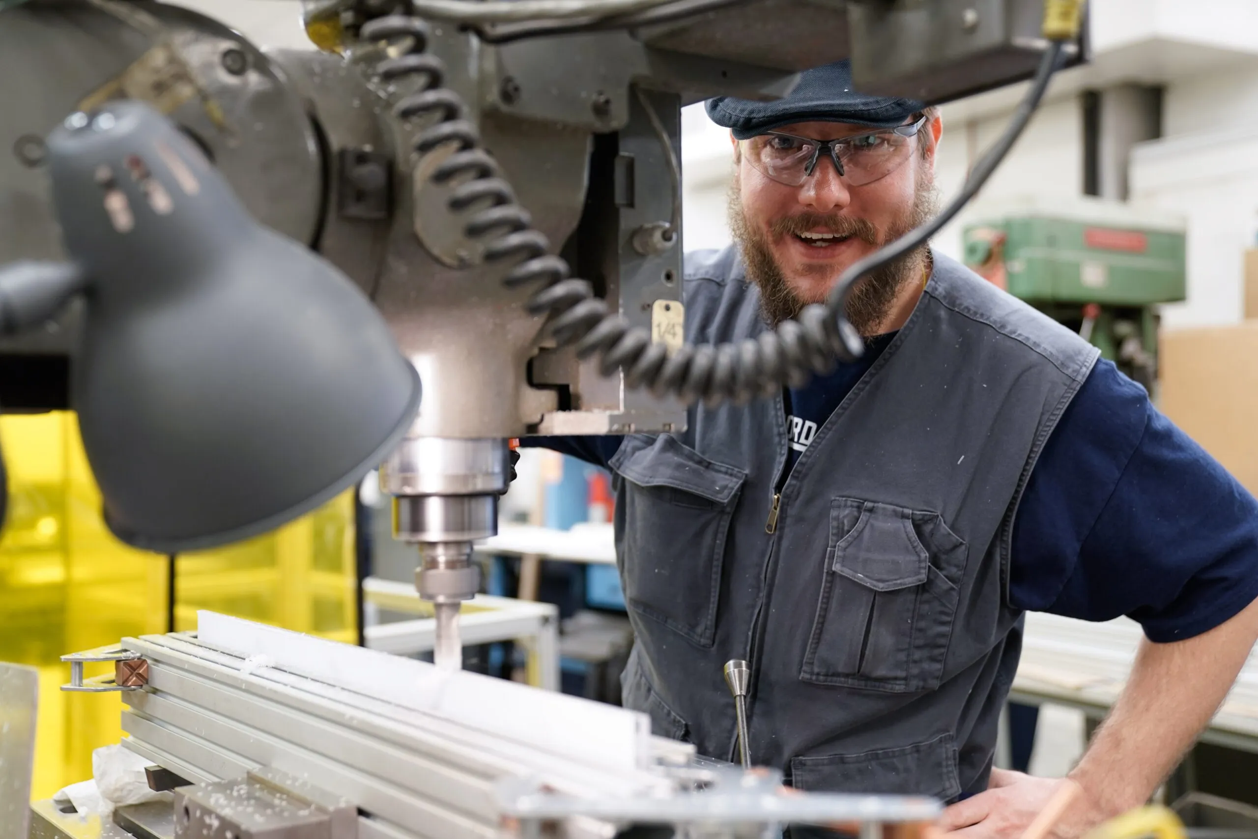 smiling machine shop technician in buffalo