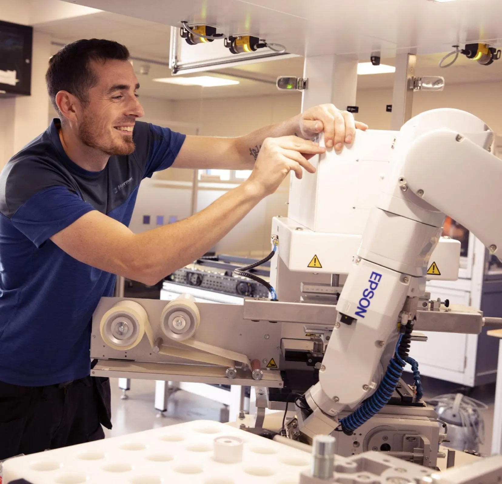 tweaking design of epson robotic manufacturing arm
